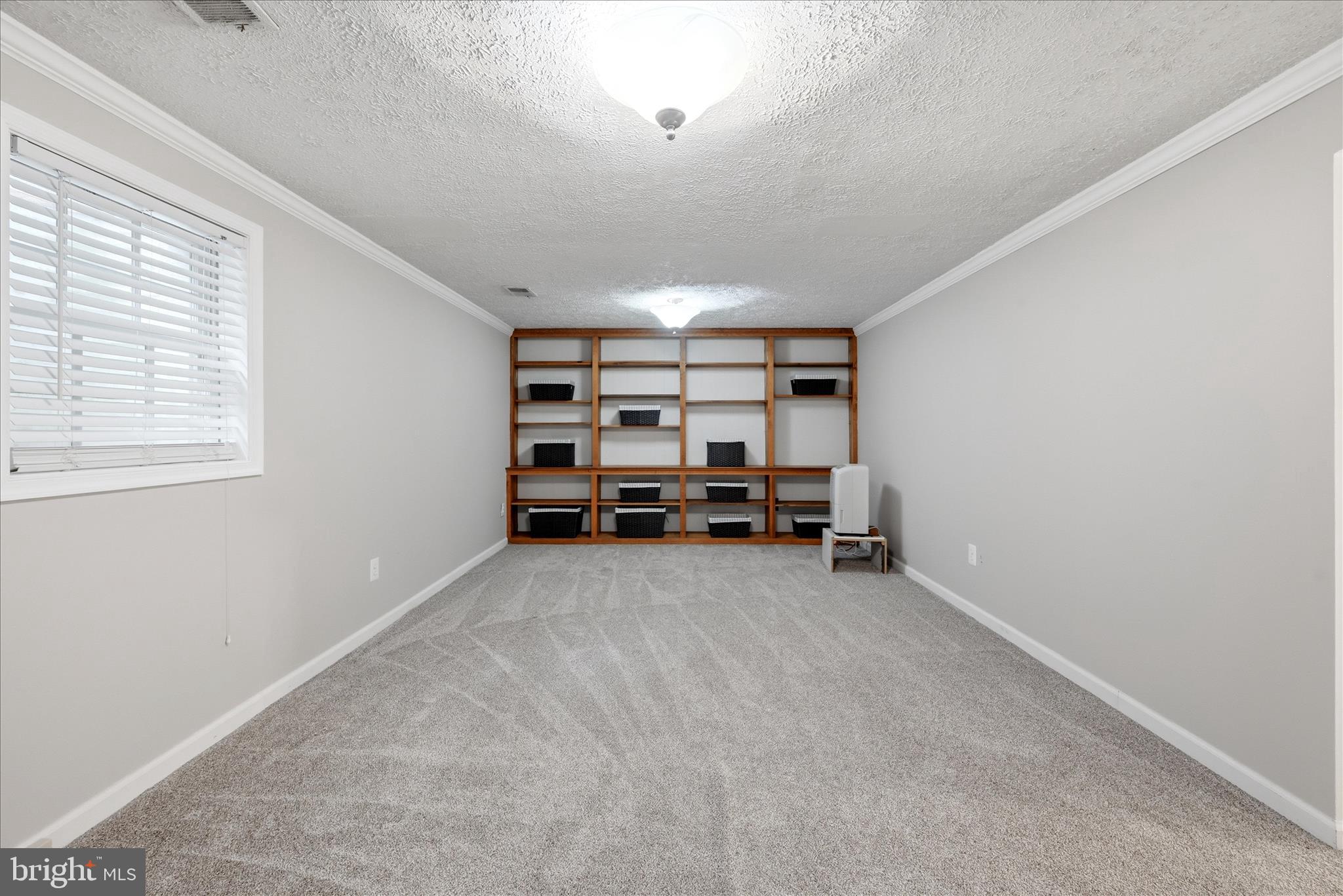 5446 Lighthouse Lane Burke, VA 22015 - Photo 22 of 36 an empty room with furniture and window