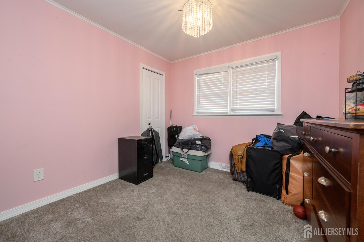 384 Cook Road Jackson, NJ 08527 - Photo 18 of 31 a bedroom with furniture and a window