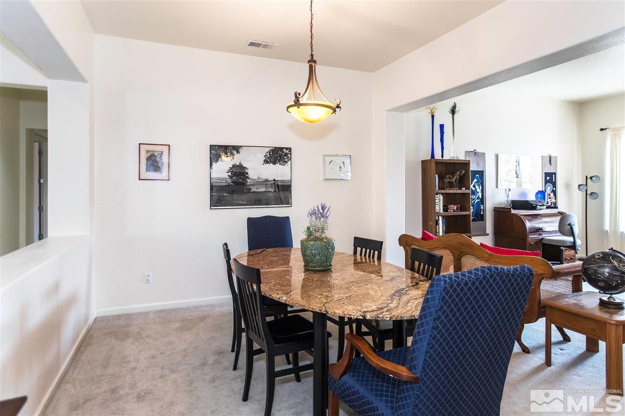 1675 Greycrest Way Reno, NV 89521 - Photo 12 of 25 a view of a dining room with furniture