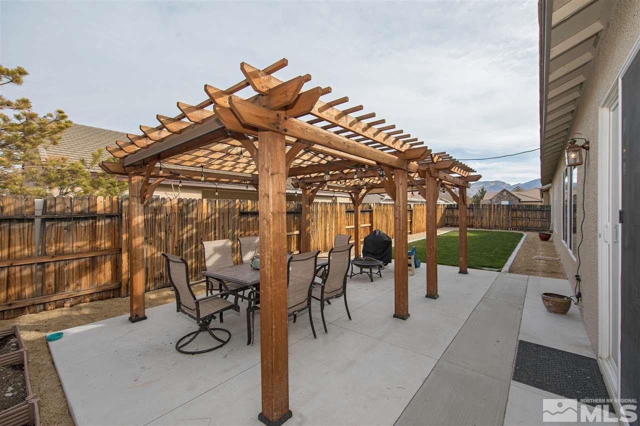 1675 Greycrest Way Reno, NV 89521 - Photo 20 of 25 a view of a chairs and tables in patio