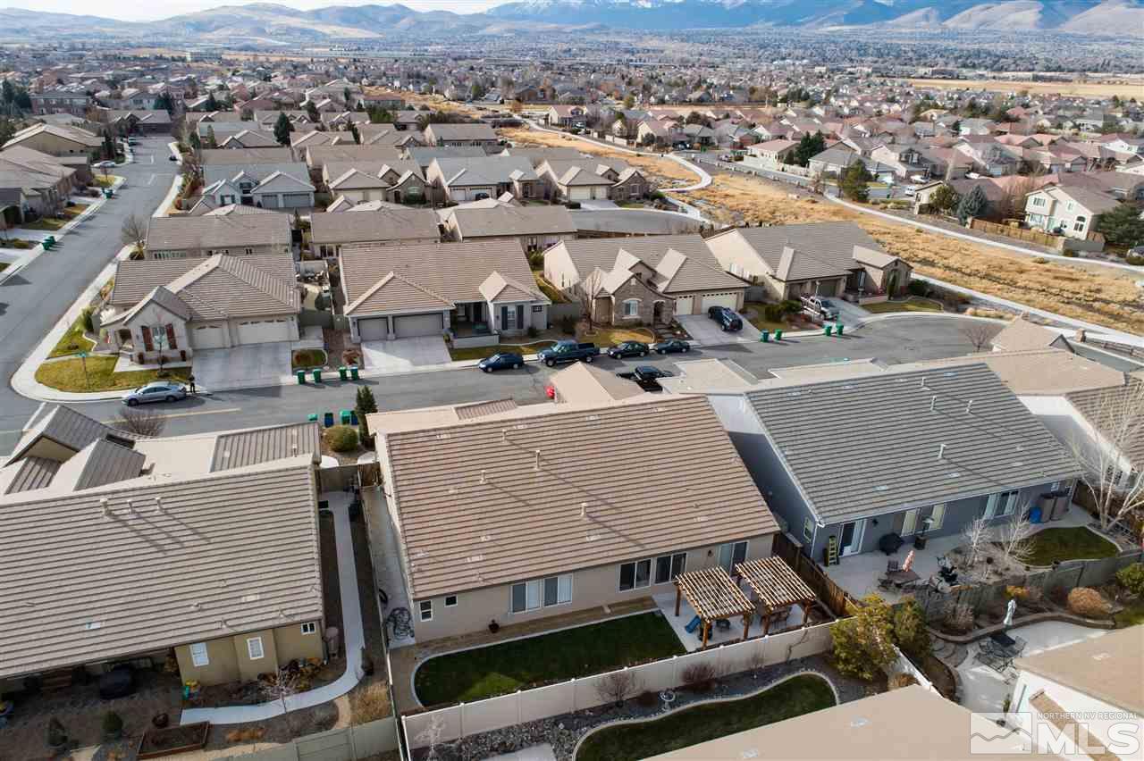 1675 Greycrest Way Reno, NV 89521 - Photo 22 of 25 an aerial view of a houses with a city view