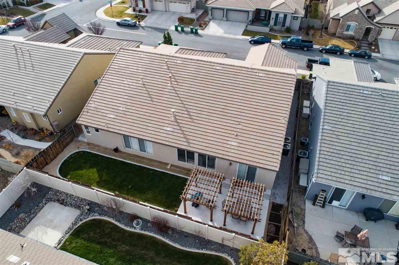 1675 Greycrest Way Reno, NV 89521 - Photo 23 of 25 a view of a patio with a table and chairs