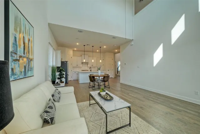 a dining room with furniture and windows