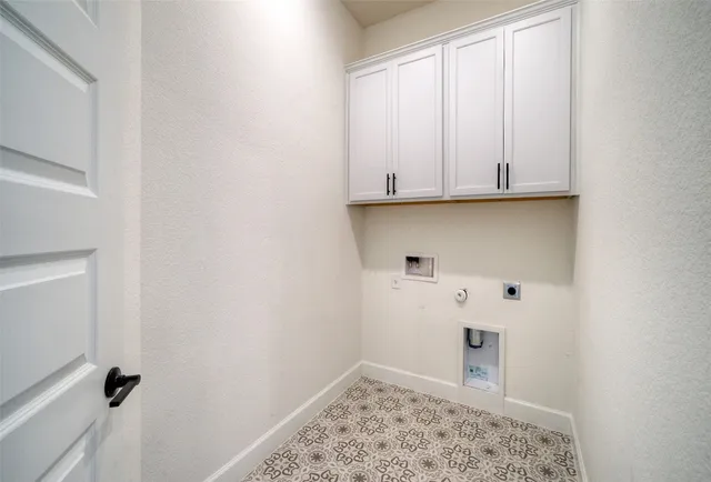 a bathroom with a shower and a glass door