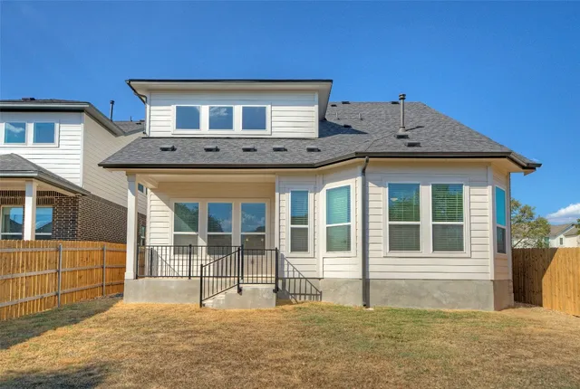 a view of a balcony with wooden floor
