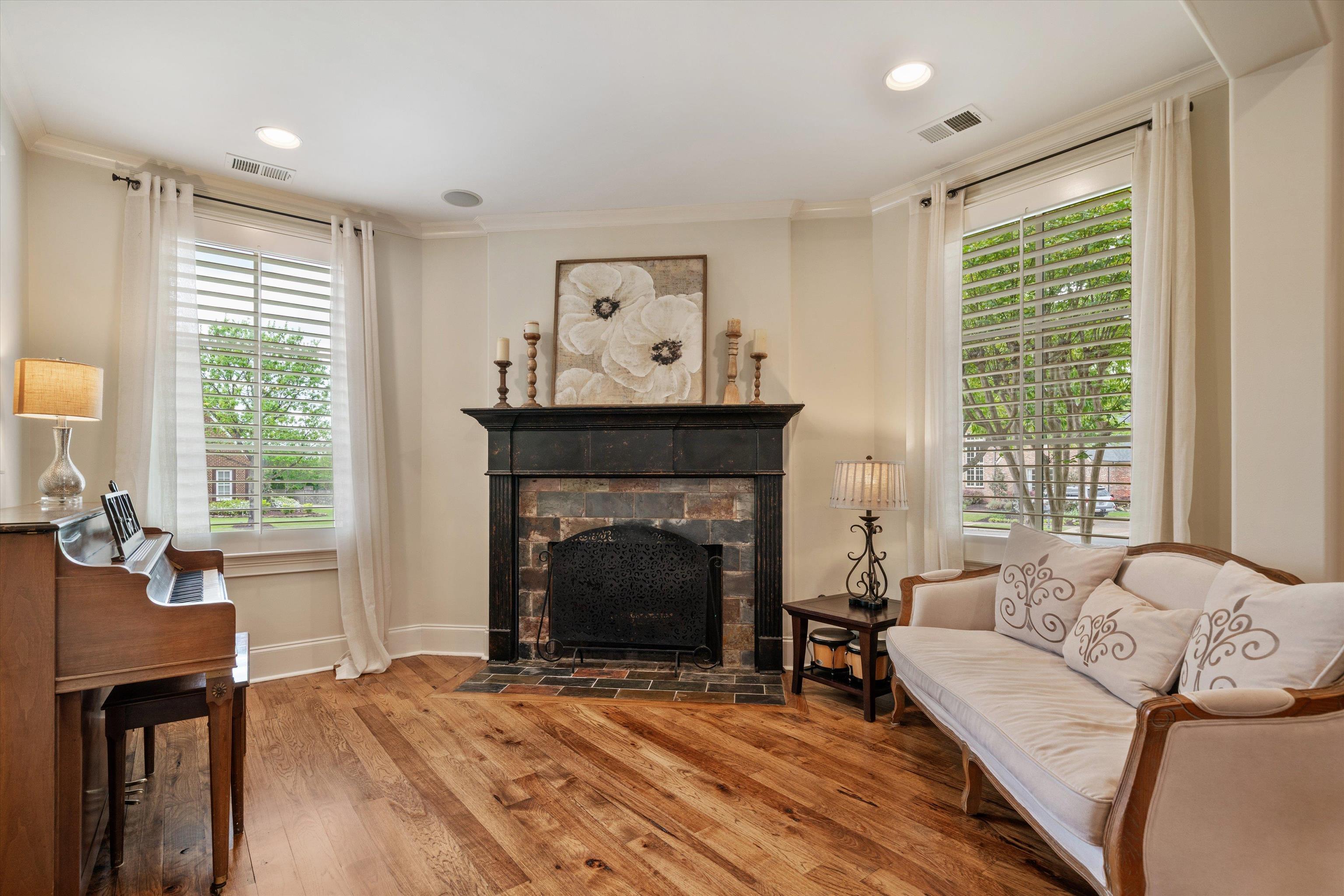 1328 Bridgepointe Drive Collierville, TN 38017 - Photo 13 of 40 a living room with furniture and a fireplace