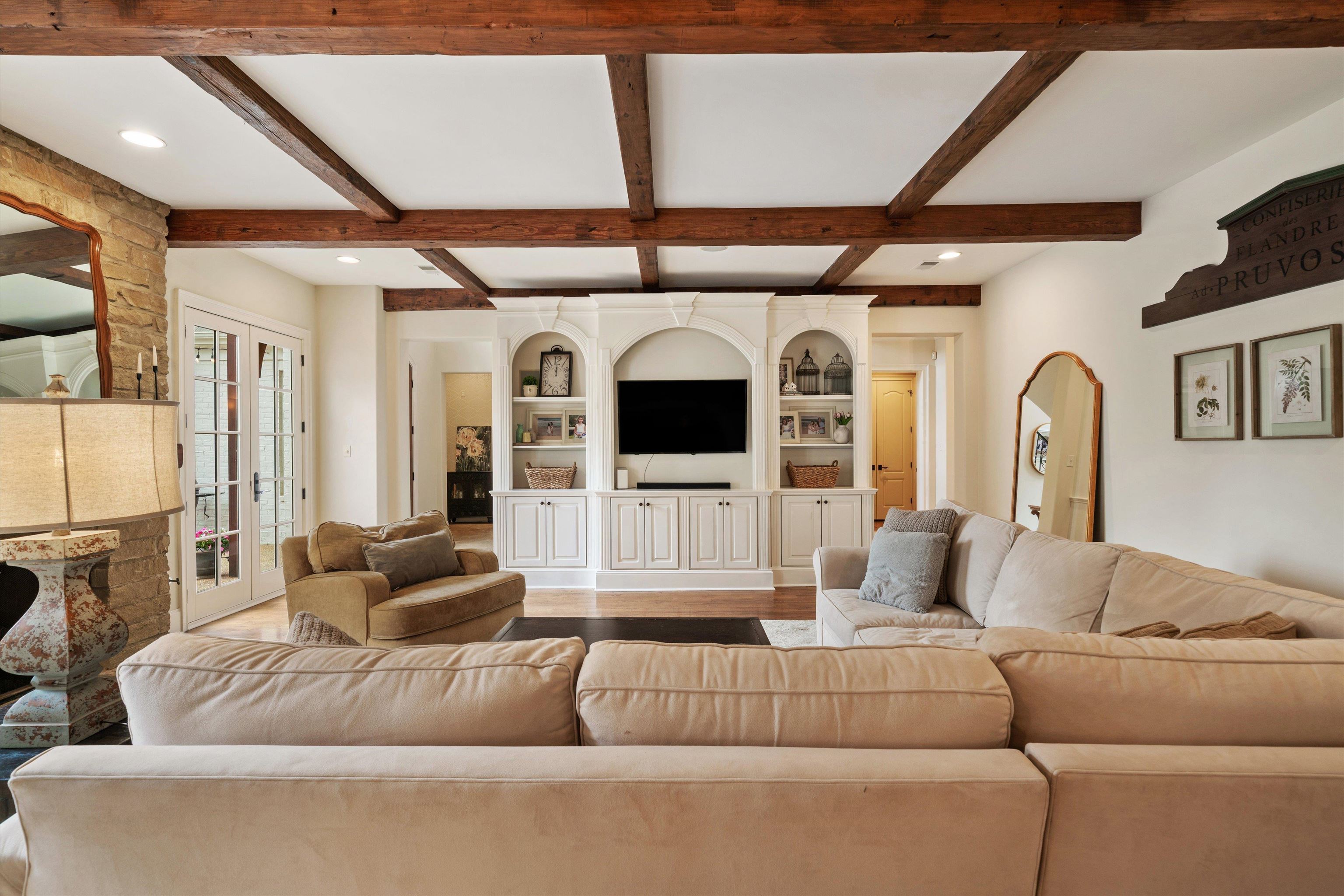 1328 Bridgepointe Drive Collierville, TN 38017 - Photo 15 of 40 a living room with furniture fireplace and flat screen tv