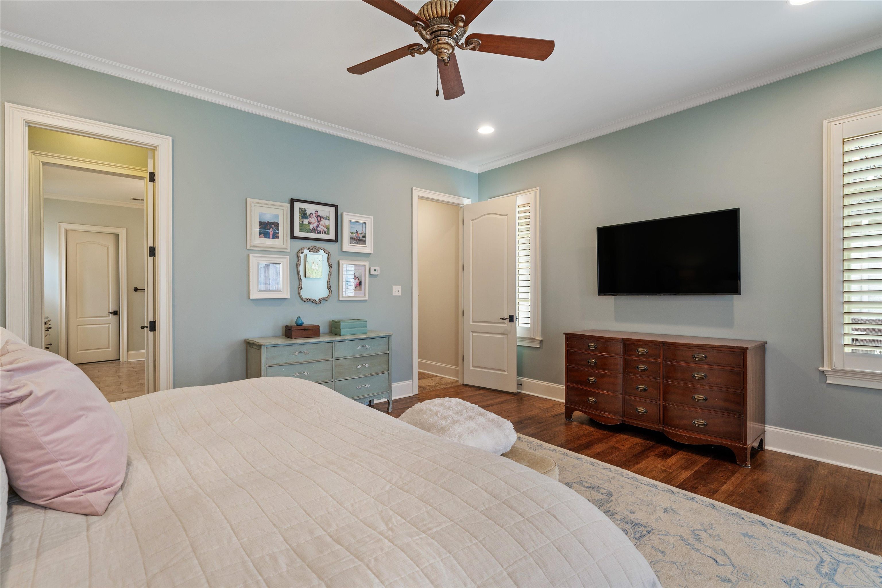 1328 Bridgepointe Drive Collierville, TN 38017 - Photo 22 of 40 a bedroom with a bed and a flat screen tv