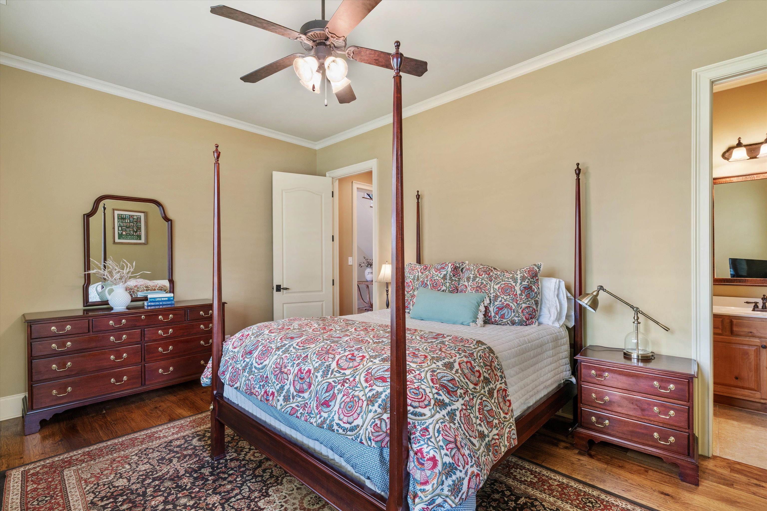 1328 Bridgepointe Drive Collierville, TN 38017 - Photo 23 of 40 a bedroom with a bed and wooden floor