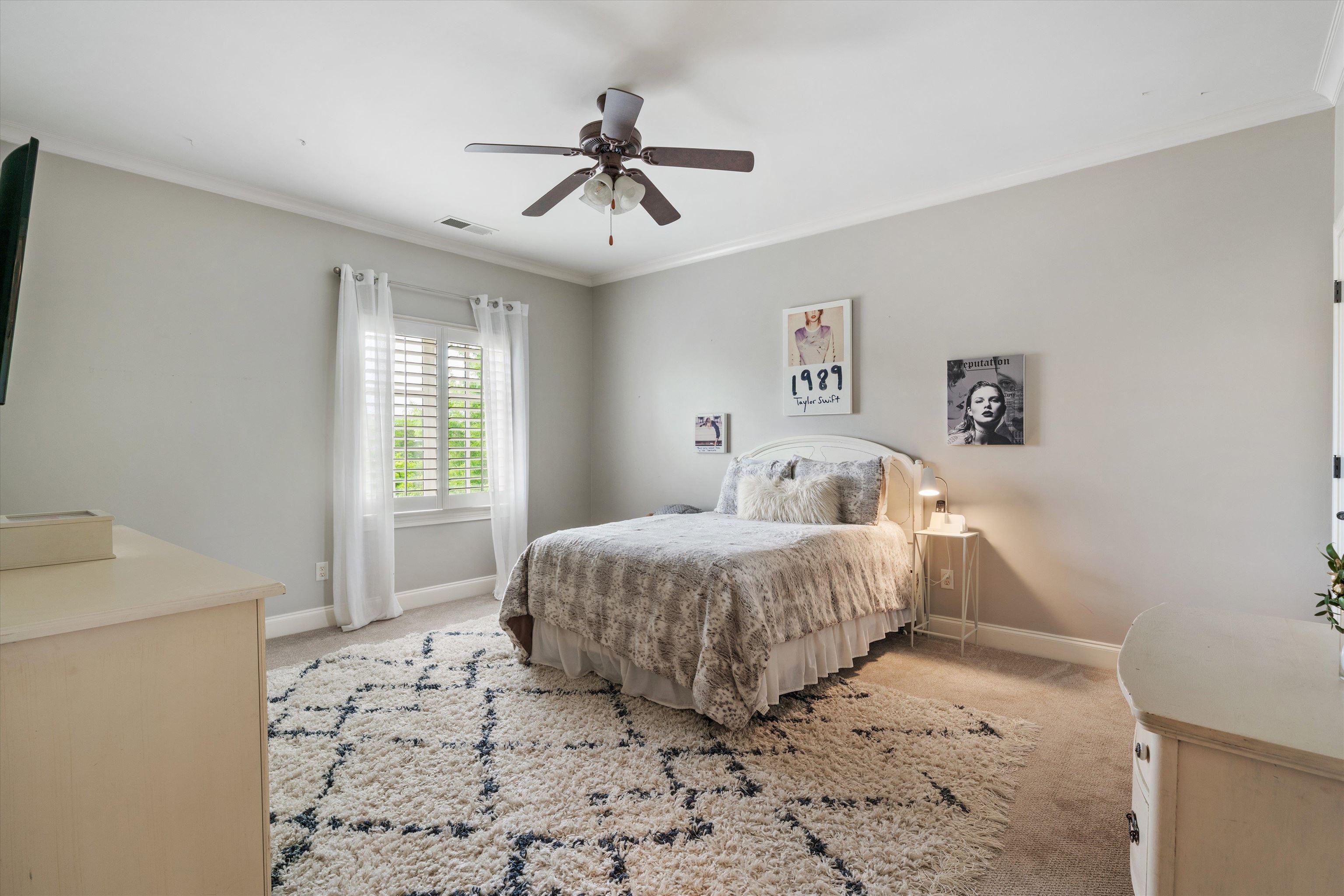 1328 Bridgepointe Drive Collierville, TN 38017 - Photo 27 of 40 a spacious bedroom with a bed and a window