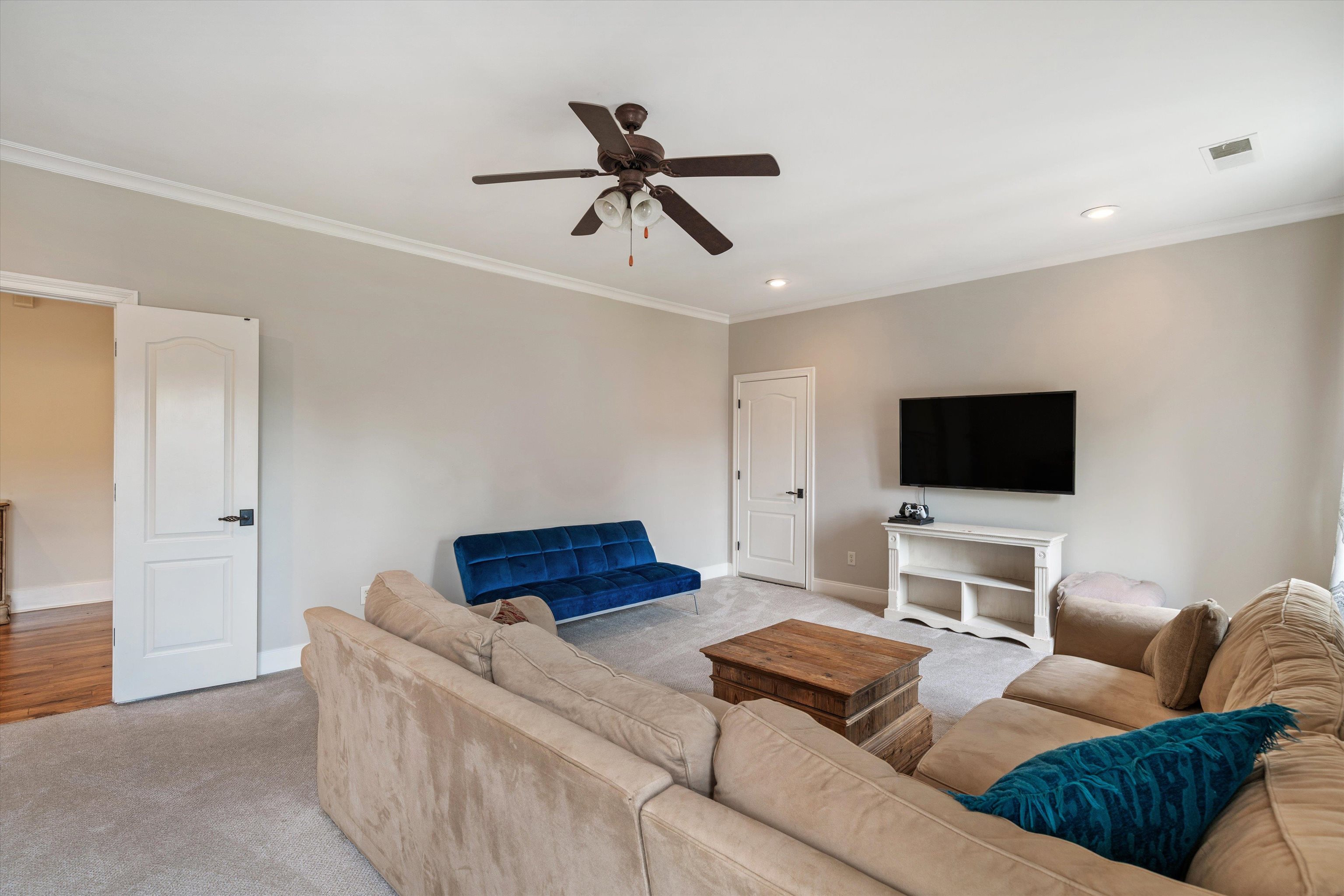 1328 Bridgepointe Drive Collierville, TN 38017 - Photo 32 of 40 a living room with furniture and a flat screen tv