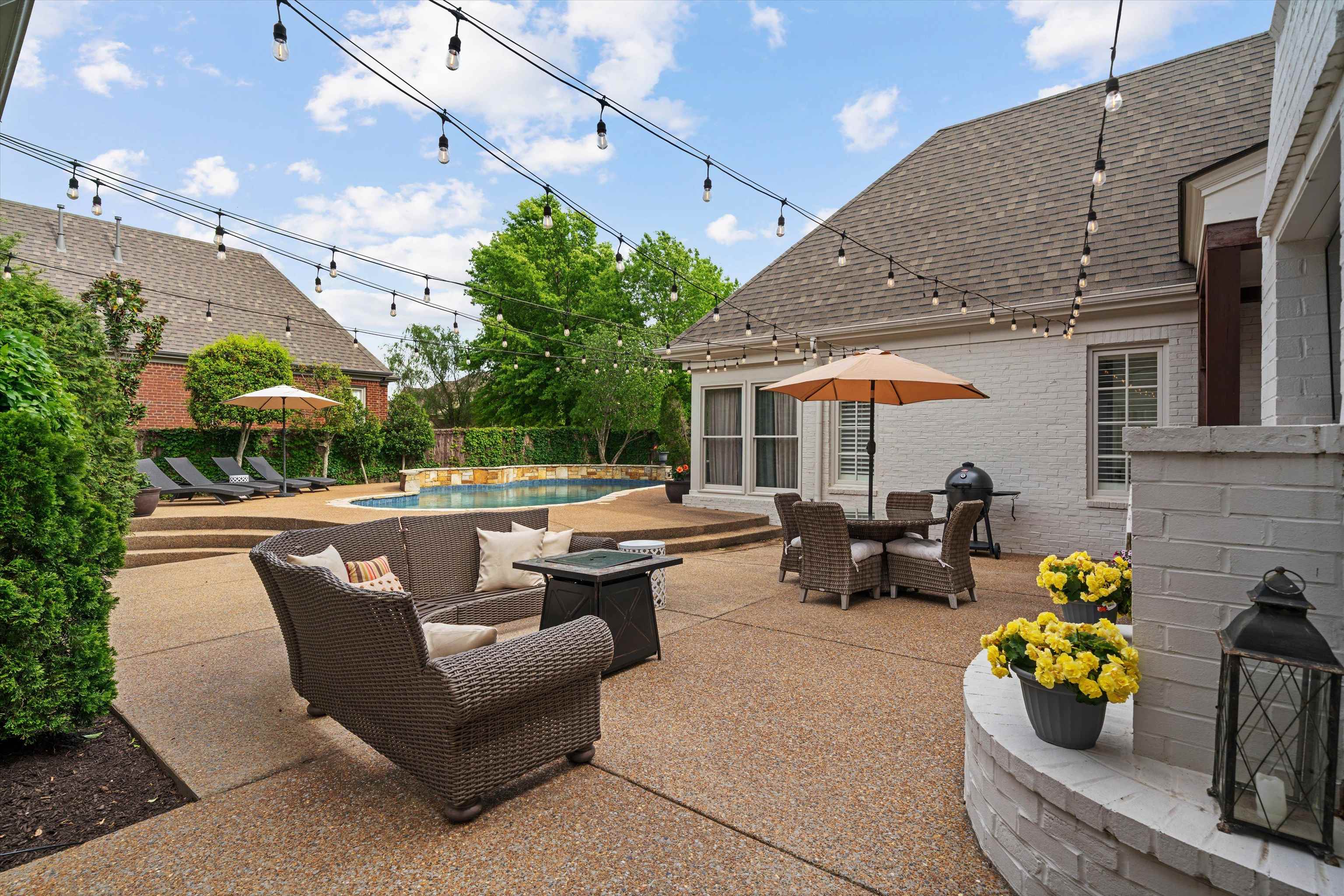 1328 Bridgepointe Drive Collierville, TN 38017 - Photo 34 of 40 a outdoor living space with furniture and a potted plant