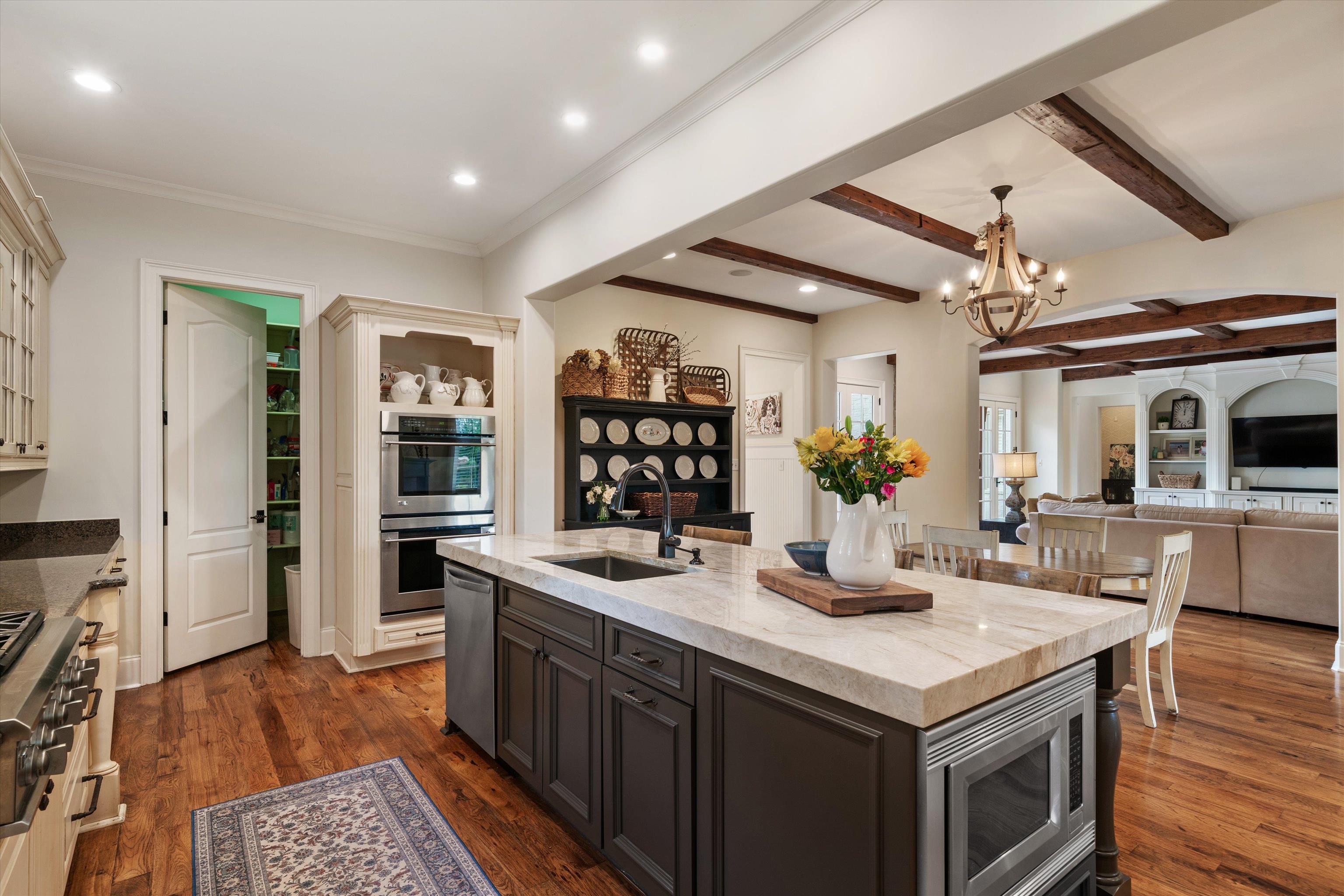 1328 Bridgepointe Drive Collierville, TN 38017 - Photo 10 of 40 a kitchen with a stove and a refrigerator