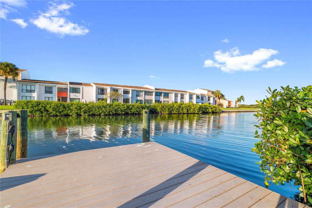 328 6th Avenue Indian Rocks Beach, FL 33785 - Photo 22 of 45 a view of a lake with a house