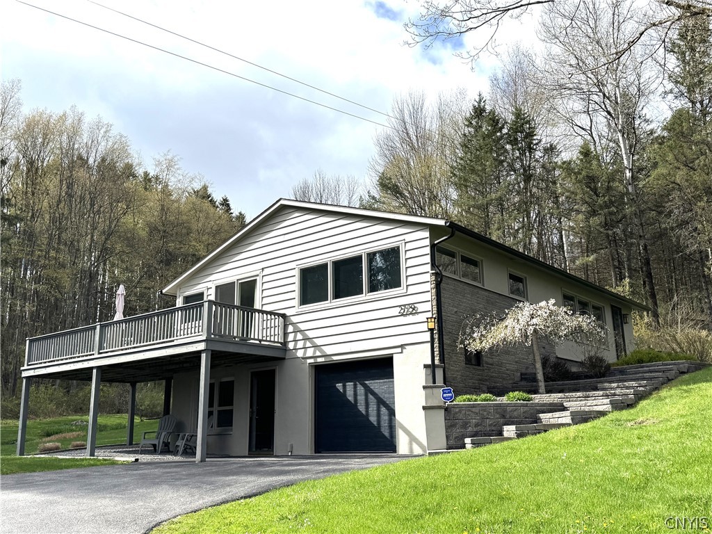 2729 West Hill Road Madison, NY 13346 - Photo 13 of 46 single car garage under house