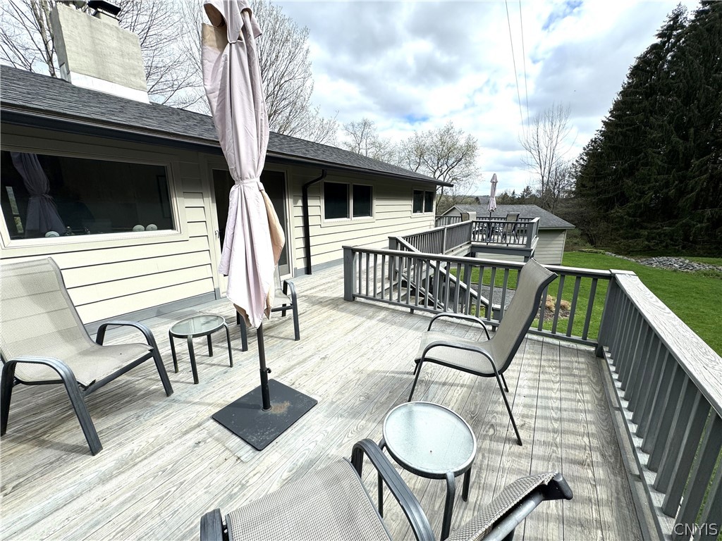 2729 West Hill Road Madison, NY 13346 - Photo 15 of 46 deck runs the length of back of house