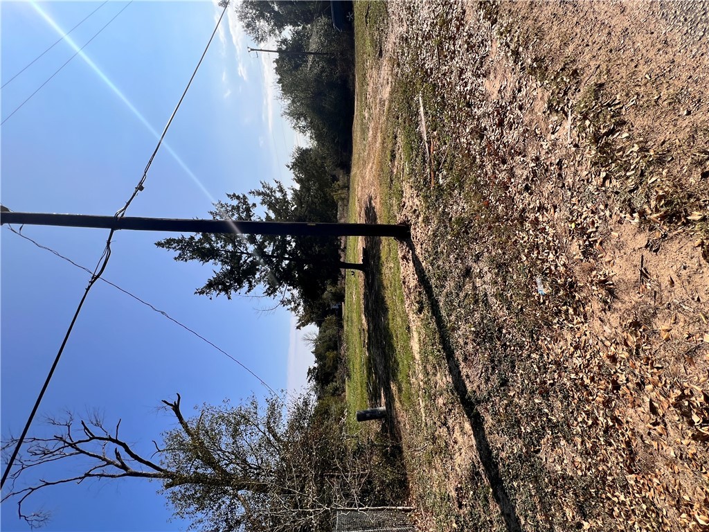 1400 Allen Road Brenham, TX 77833 - Photo 7 of 10 a view of a yard with wooden fence
