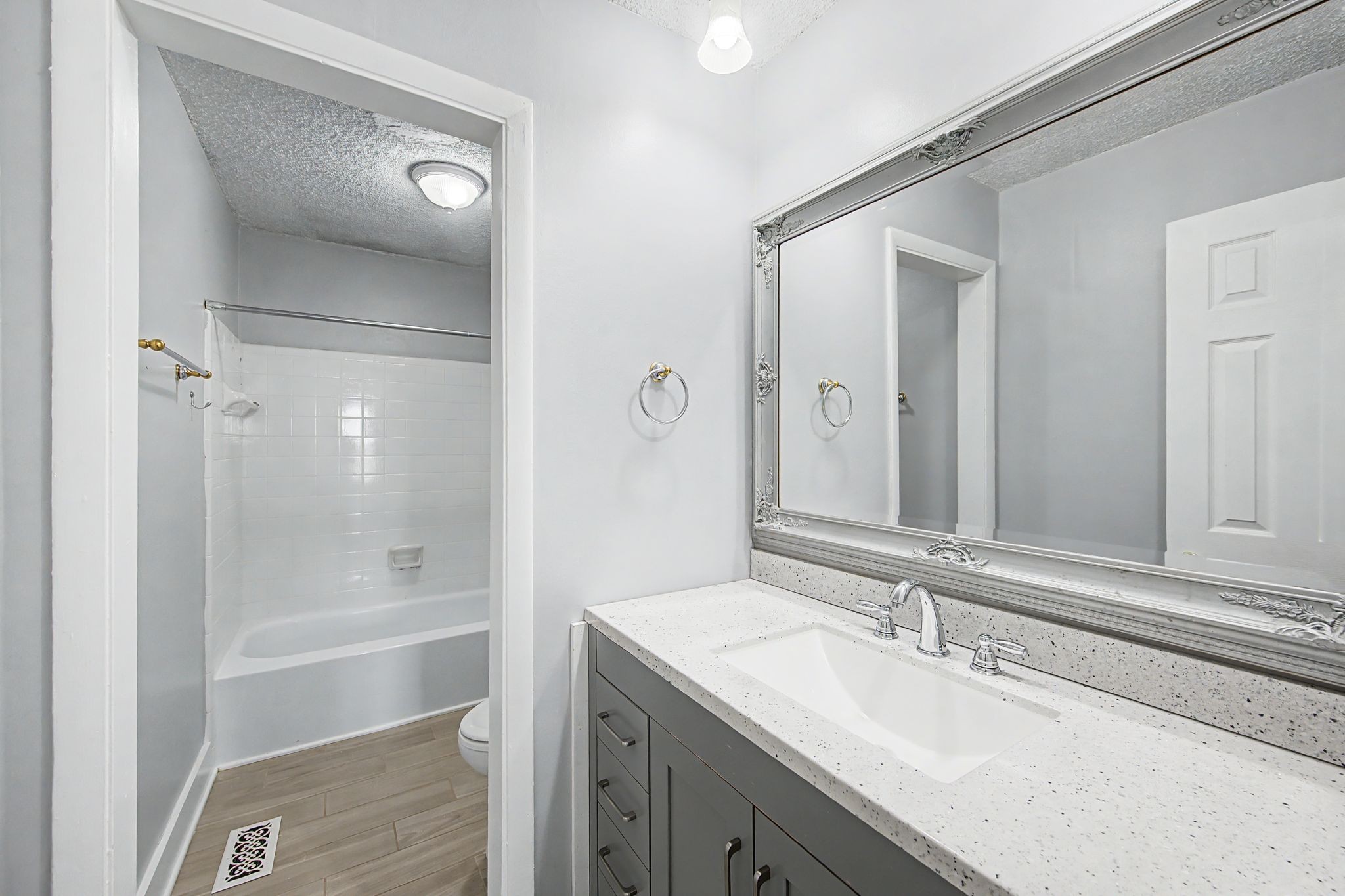110 Bellevue Road, Unit 30 Nashville, TN 37221 - Photo 18 of 43 a bathroom with a shower sink vanity and mirror
