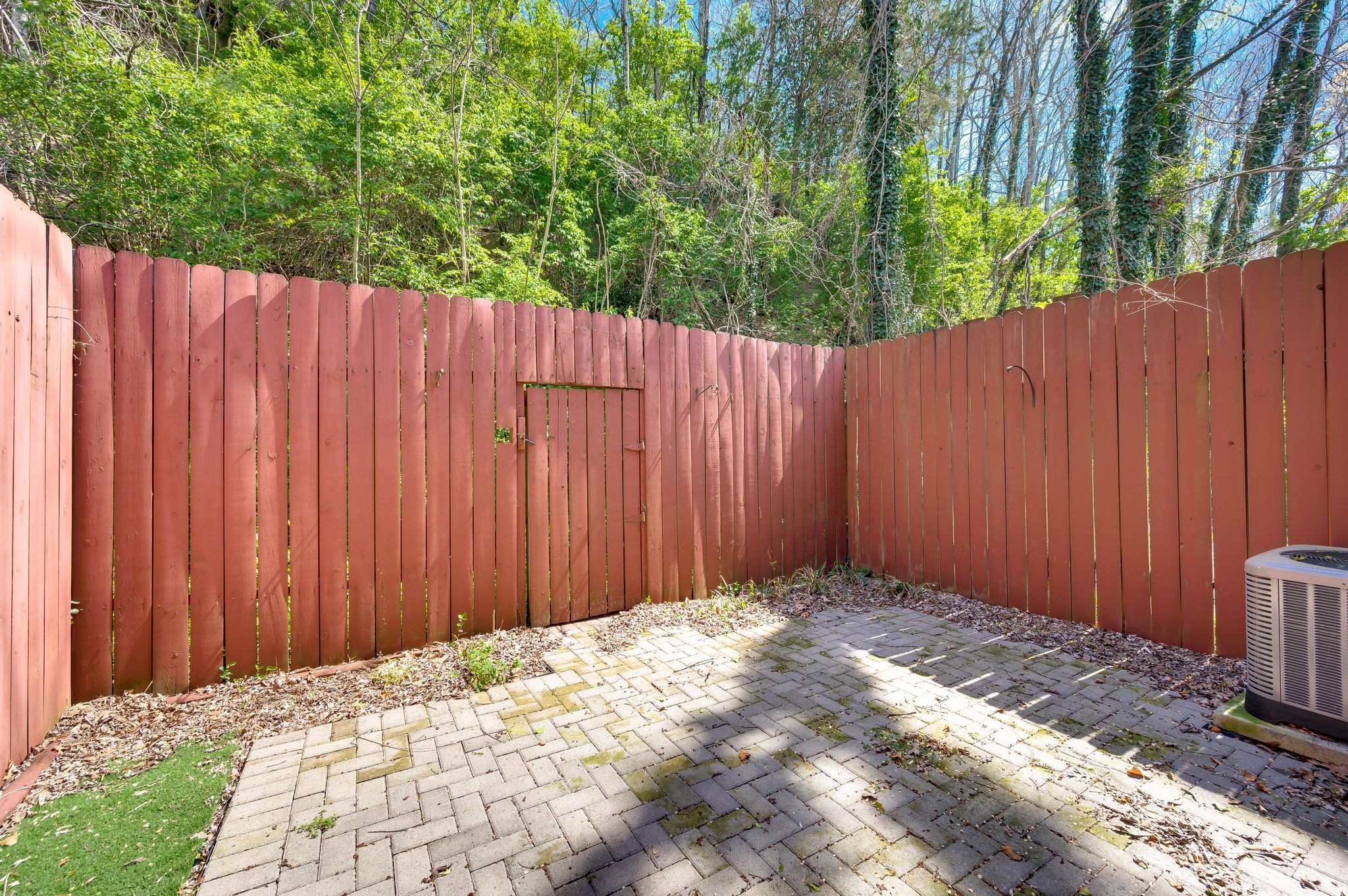 110 Bellevue Road, Unit 30 Nashville, TN 37221 - Photo 24 of 43 a view of a backyard with wooden fence