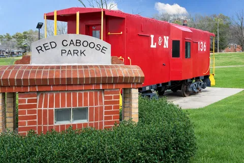 a view of a street with cars