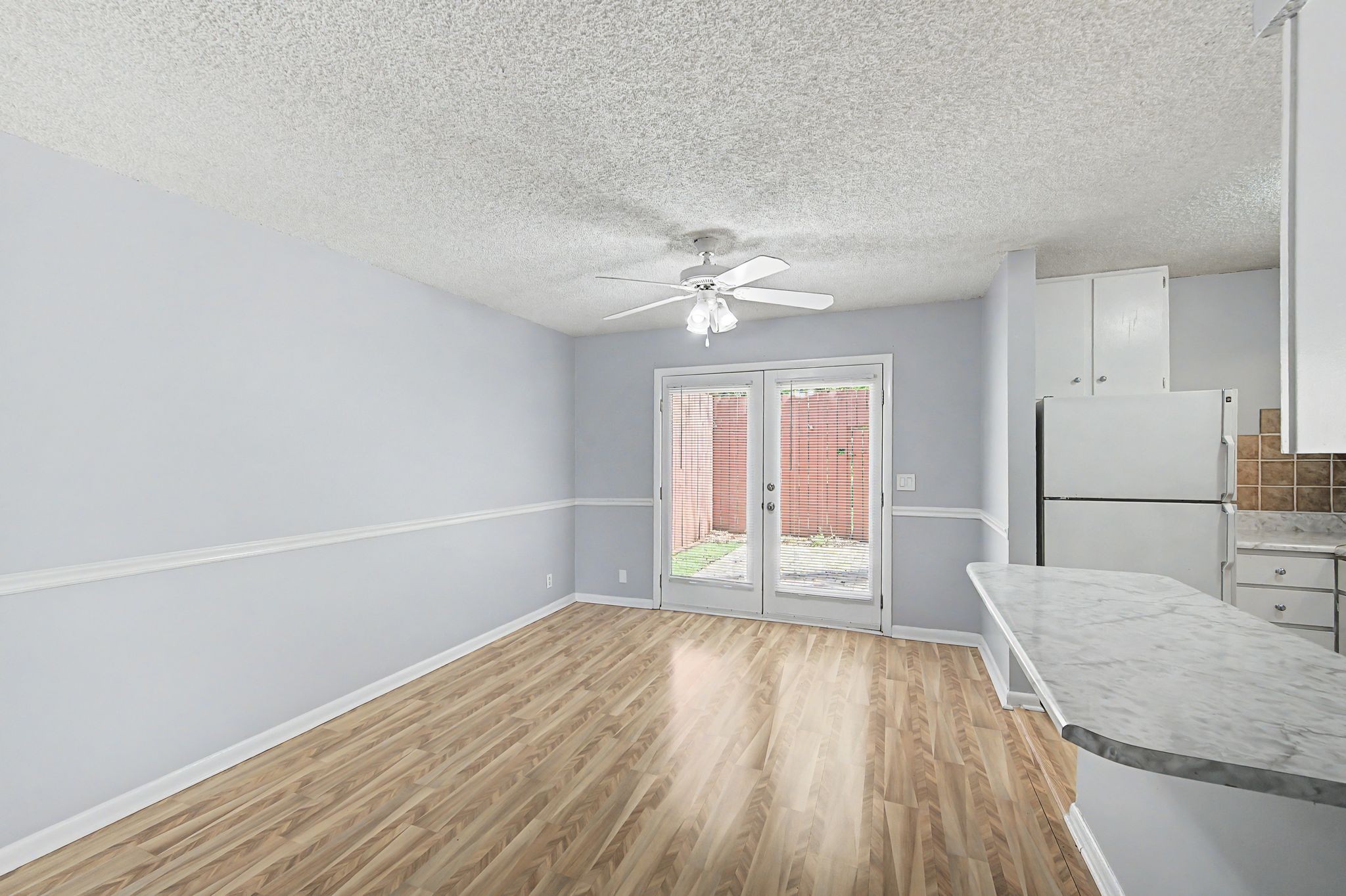 110 Bellevue Road, Unit 30 Nashville, TN 37221 - Photo 8 of 43 wooden floor in an empty room with a window