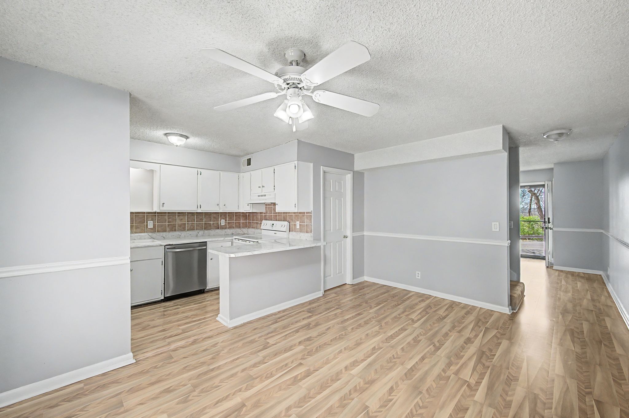 110 Bellevue Road, Unit 30 Nashville, TN 37221 - Photo 9 of 43 a open kitchen with white cabinets and sink