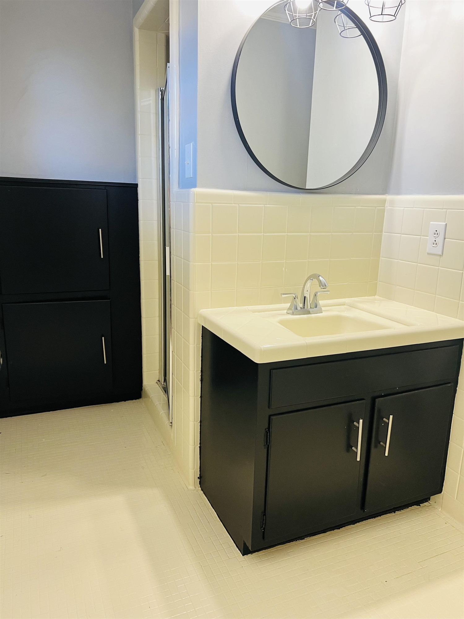 2419 Raeford Road Fayetteville, NC 28305 - Photo 12 of 36 a bathroom with a sink vanity and a mirror