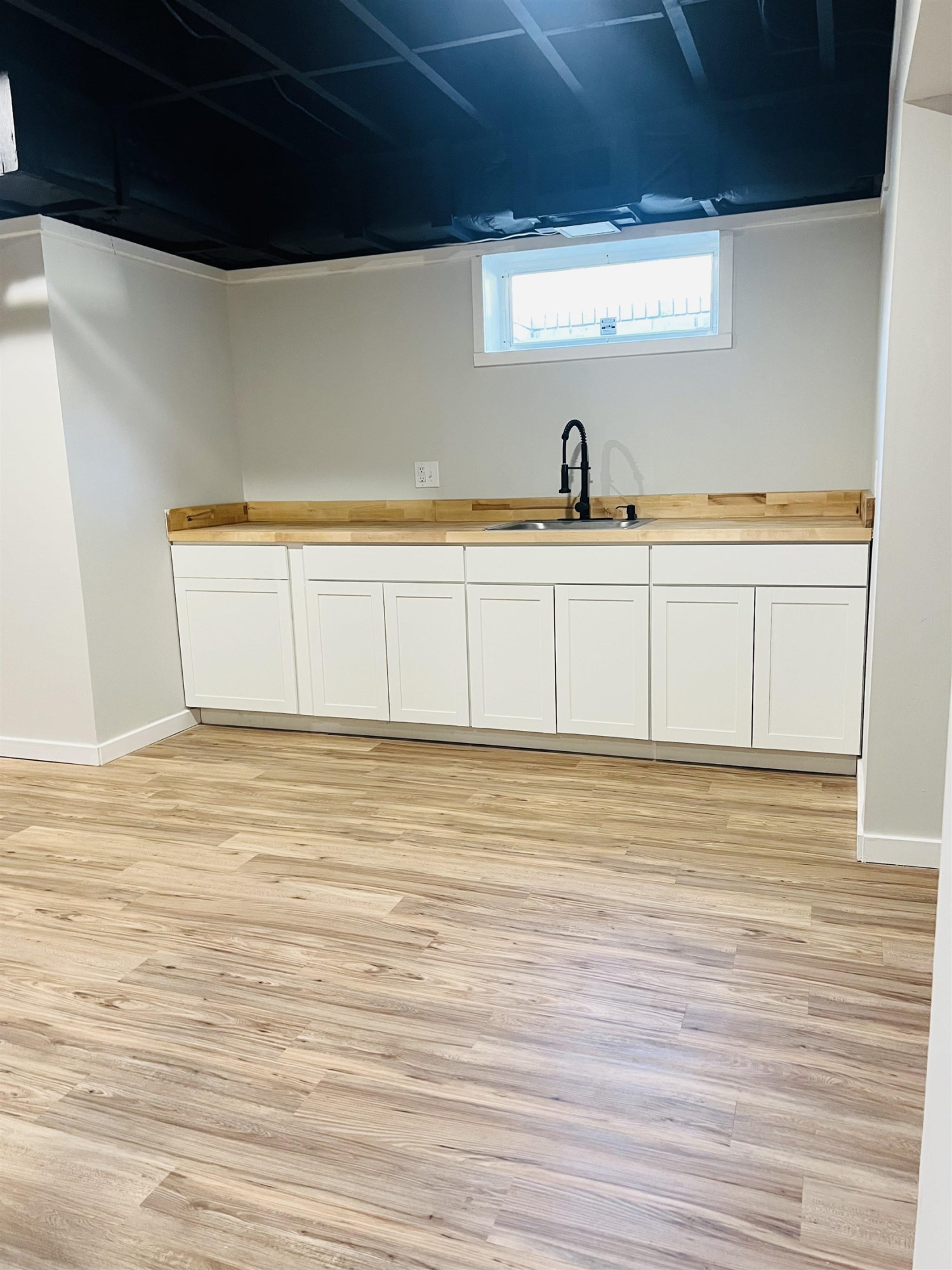 2419 Raeford Road Fayetteville, NC 28305 - Photo 22 of 36 a view of a room with wooden floor