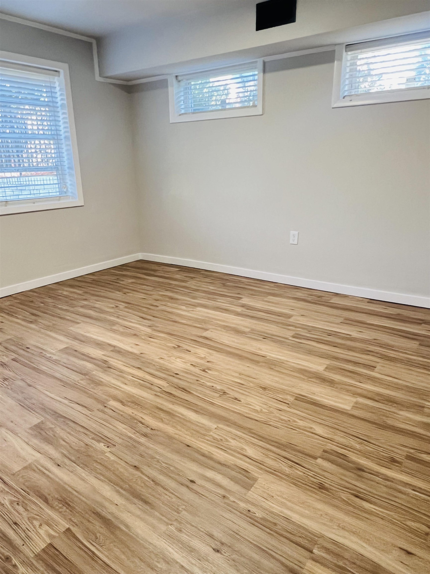 2419 Raeford Road Fayetteville, NC 28305 - Photo 29 of 36 a view of a room with wooden floor