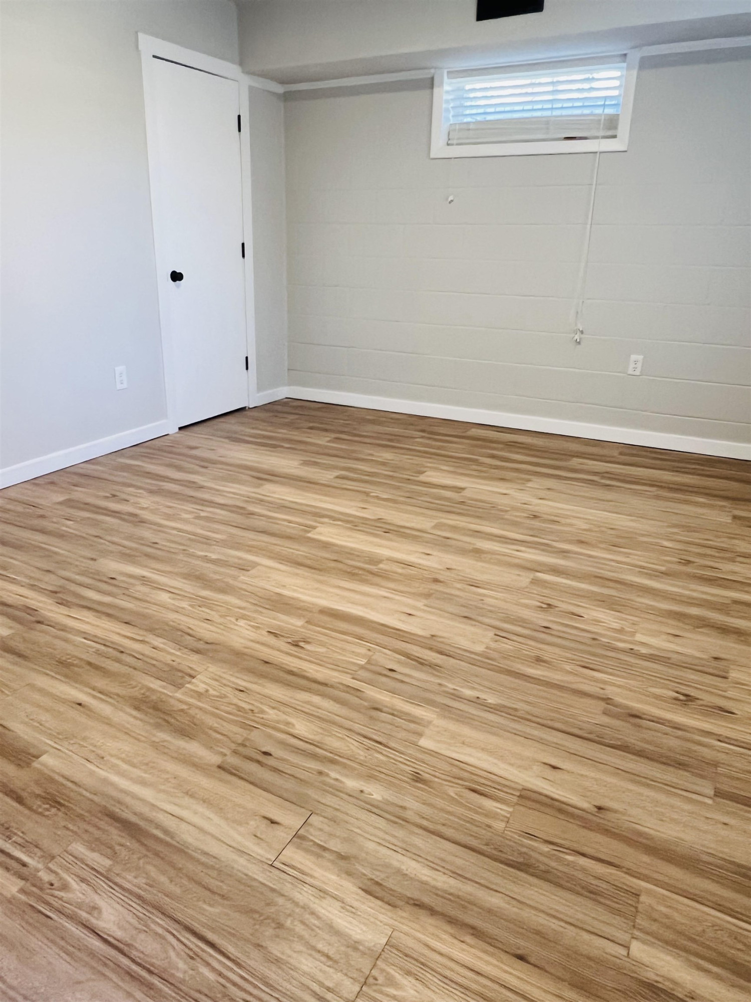 2419 Raeford Road Fayetteville, NC 28305 - Photo 30 of 36 a view of an empty room with wooden floor