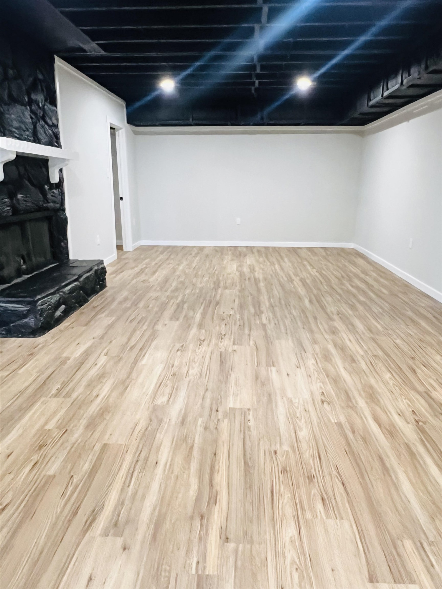 2419 Raeford Road Fayetteville, NC 28305 - Photo 33 of 36 a view of empty room with wooden floor