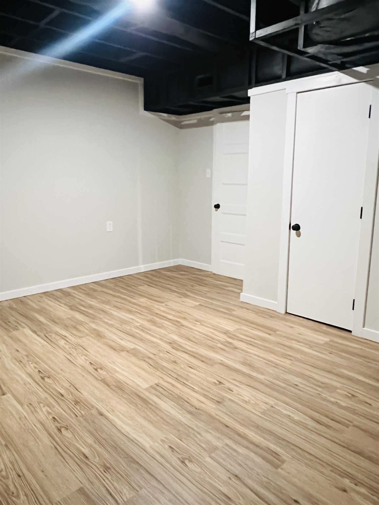 2419 Raeford Road Fayetteville, NC 28305 - Photo 35 of 36 a view of a room with wooden floor