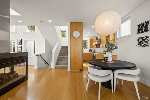 a kitchen with sink a stove and cabinets