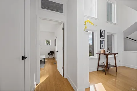 a bathroom with a toilet a sink and a mirror