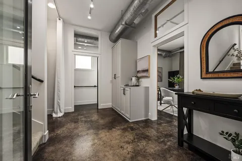 a view of hallway with washer and dryer