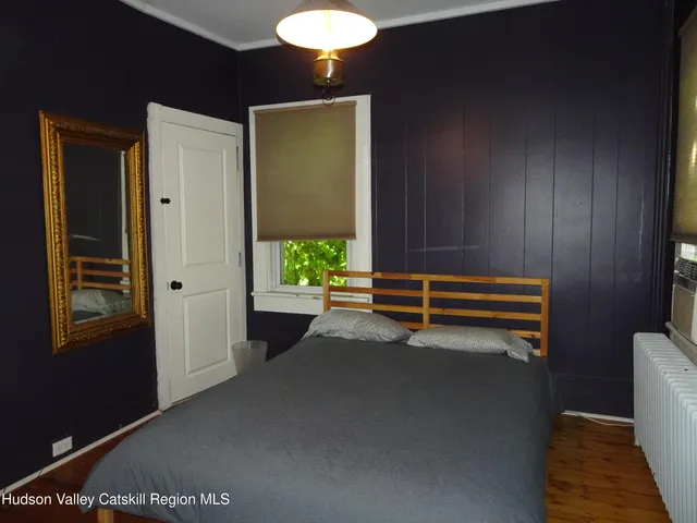 a view of room with air conditioner and window