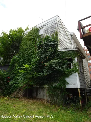 a house view with a garden space