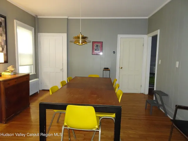 a workspace with furniture and window