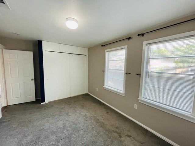 4000 Walker Street Dallas, TX 75211 - Photo 5 of 8 an empty room with a empty space and windows
