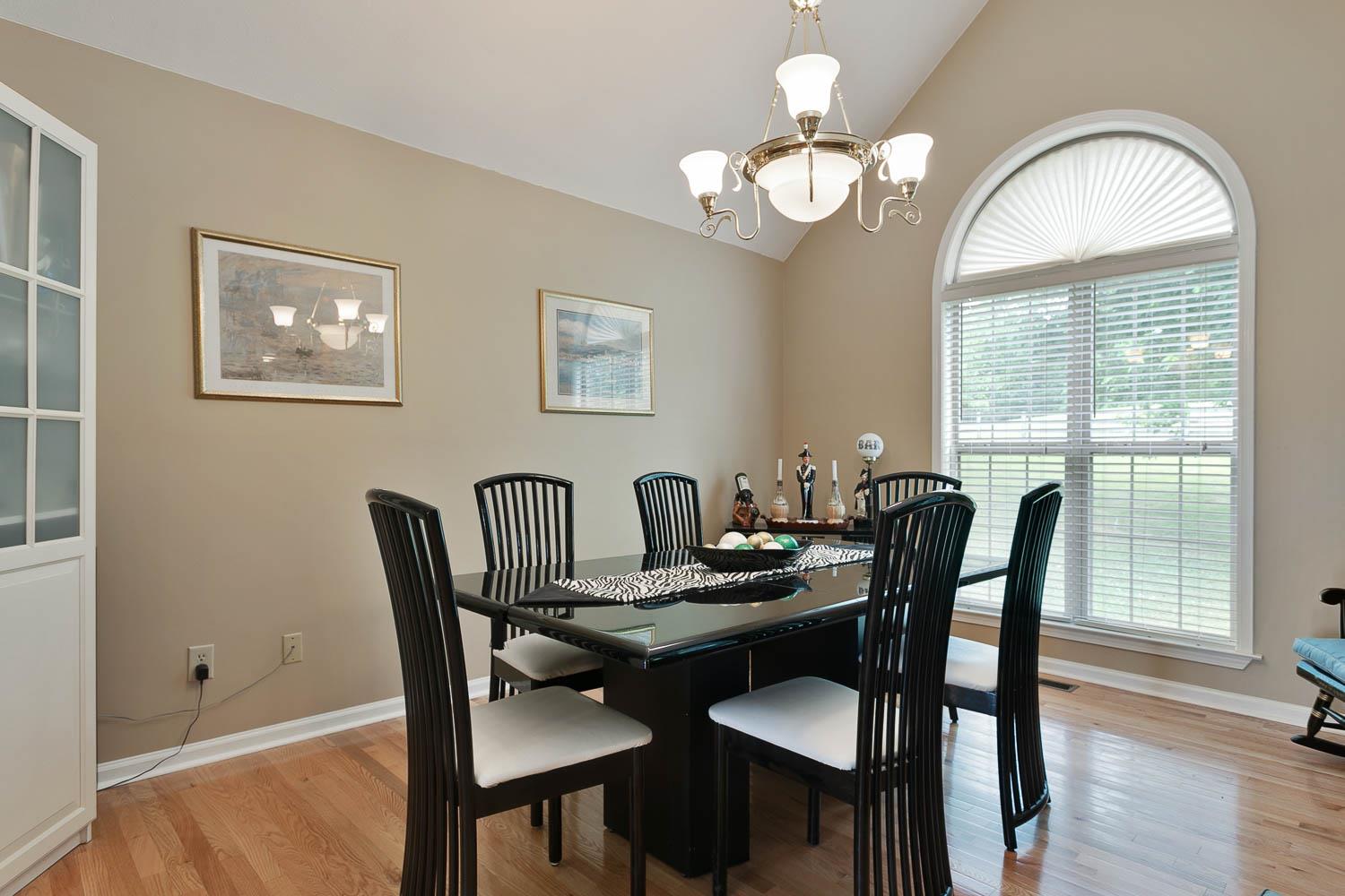 1018 Rip Steele Road Columbia, TN 38401 - Photo 12 of 28 a view of a dining room with furniture and wooden floor