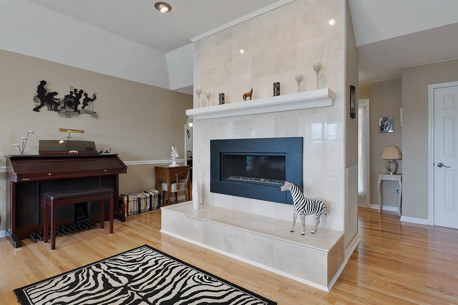 1018 Rip Steele Road Columbia, TN 38401 - Photo 14 of 28 a living room with furniture and a fireplace