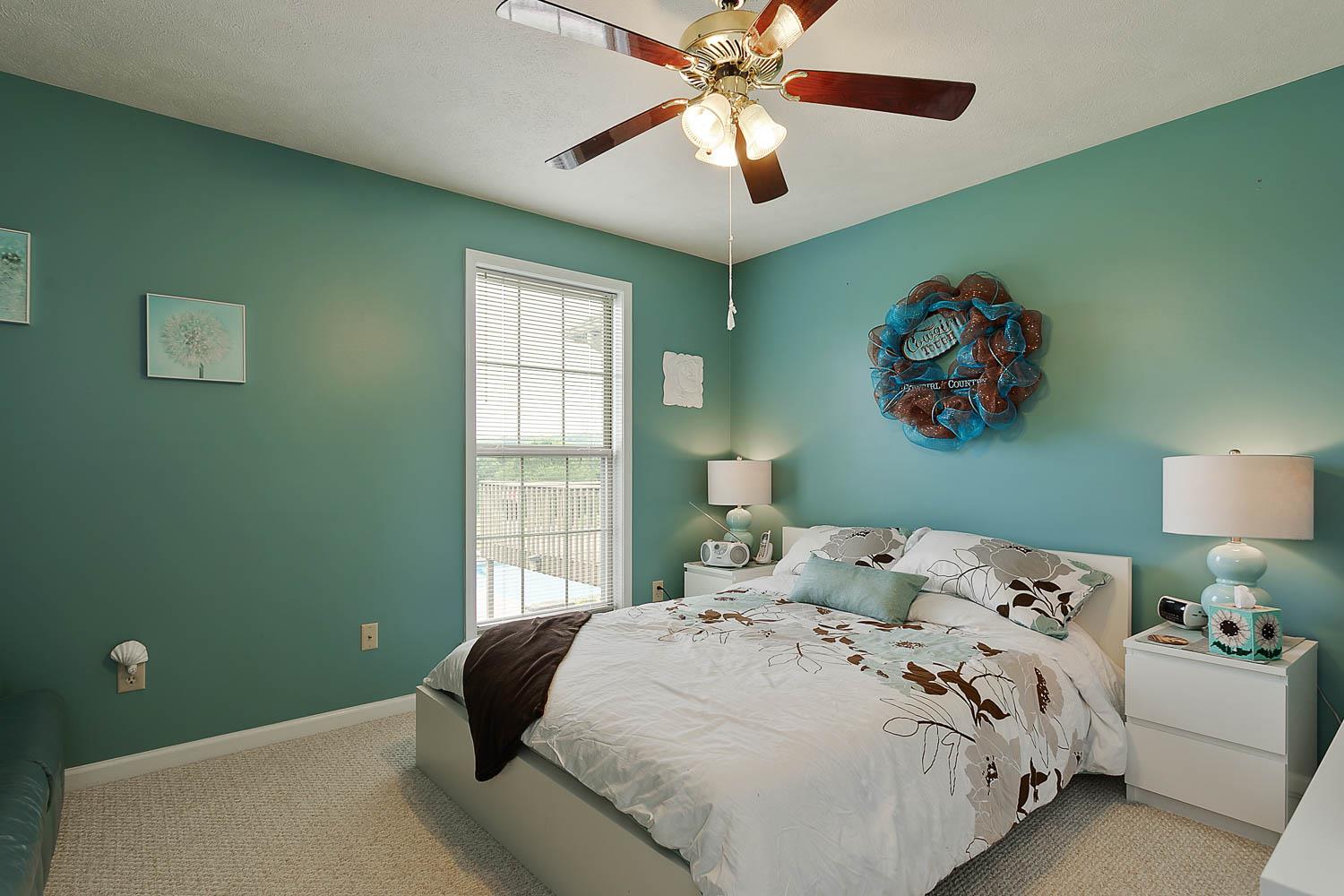 1018 Rip Steele Road Columbia, TN 38401 - Photo 22 of 28 a bedroom with a bed and a window
