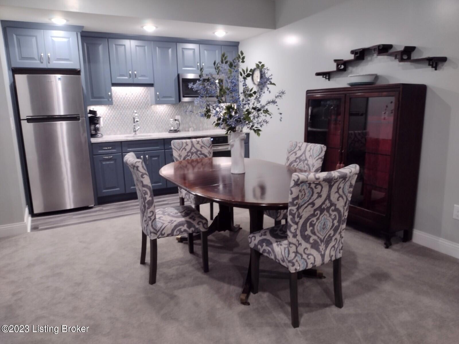 225 Maple Valley Road Louisville, KY 40245 - Photo 24 of 69 Basement dining area and kitchenette