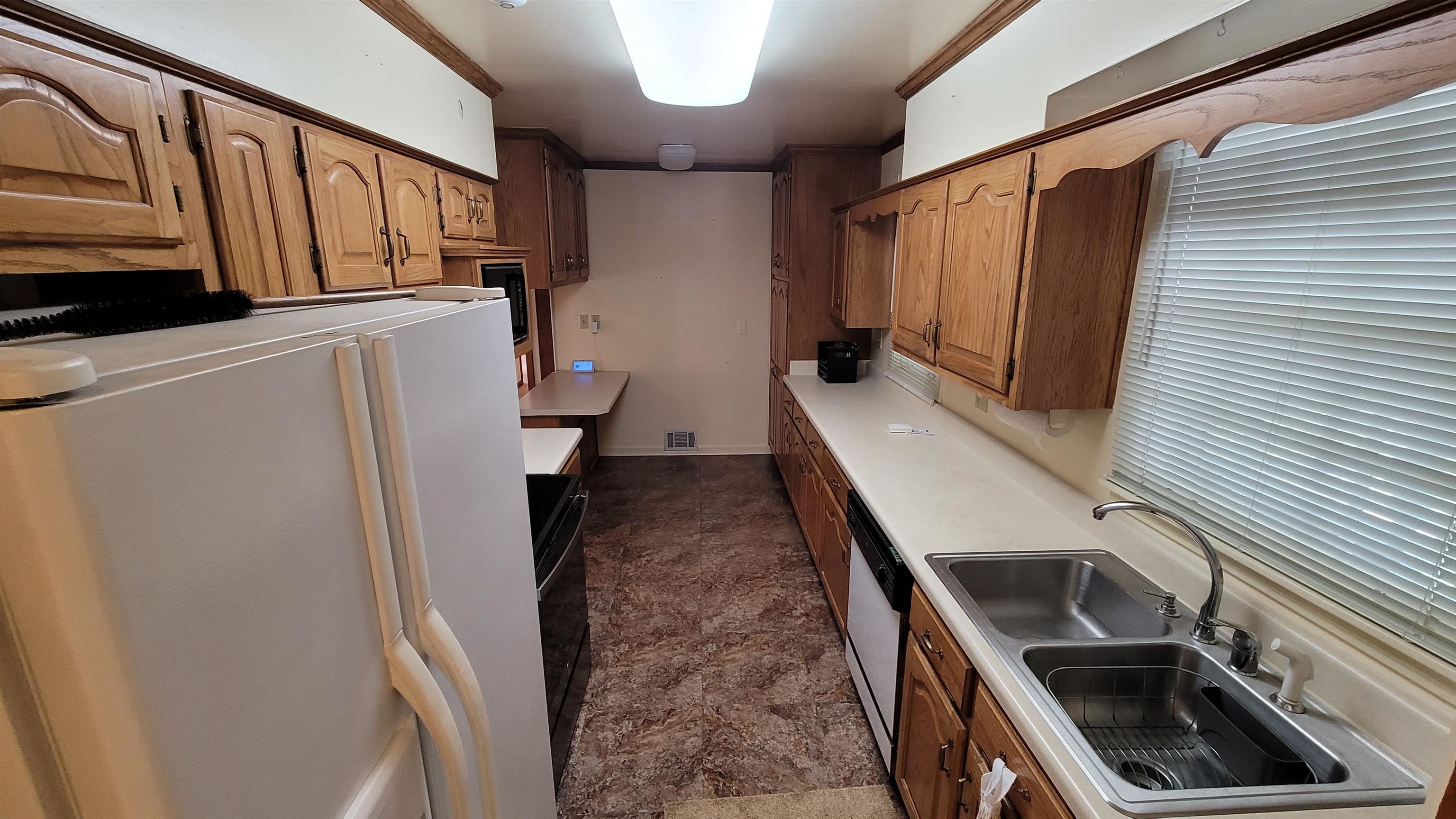 3745 Tchulahoma Road Memphis, TN 38118 - Photo 13 of 39 a bathroom with a sink a toilet a mirror and shower