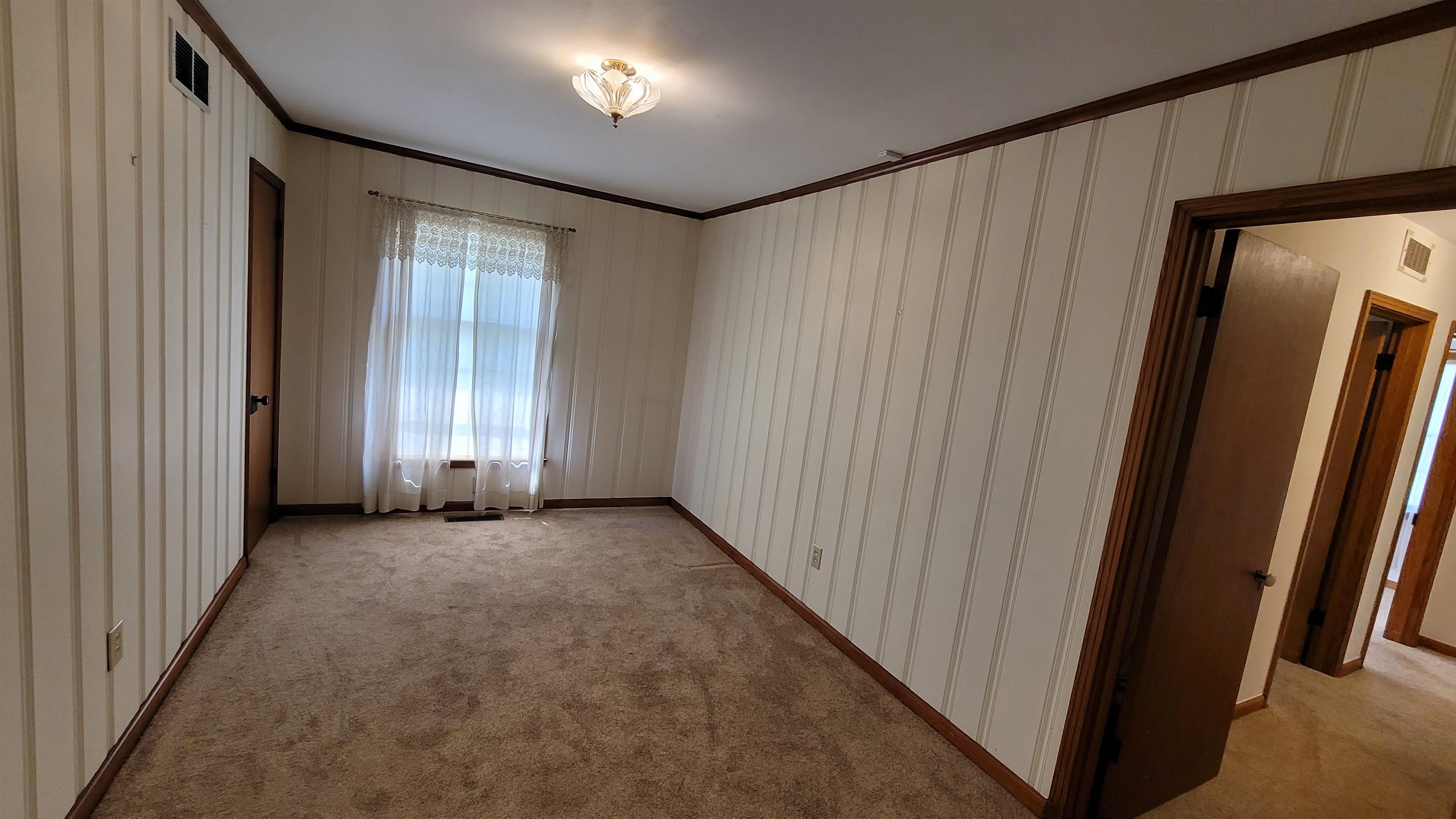 3745 Tchulahoma Road Memphis, TN 38118 - Photo 19 of 39 a view of an empty room with a window