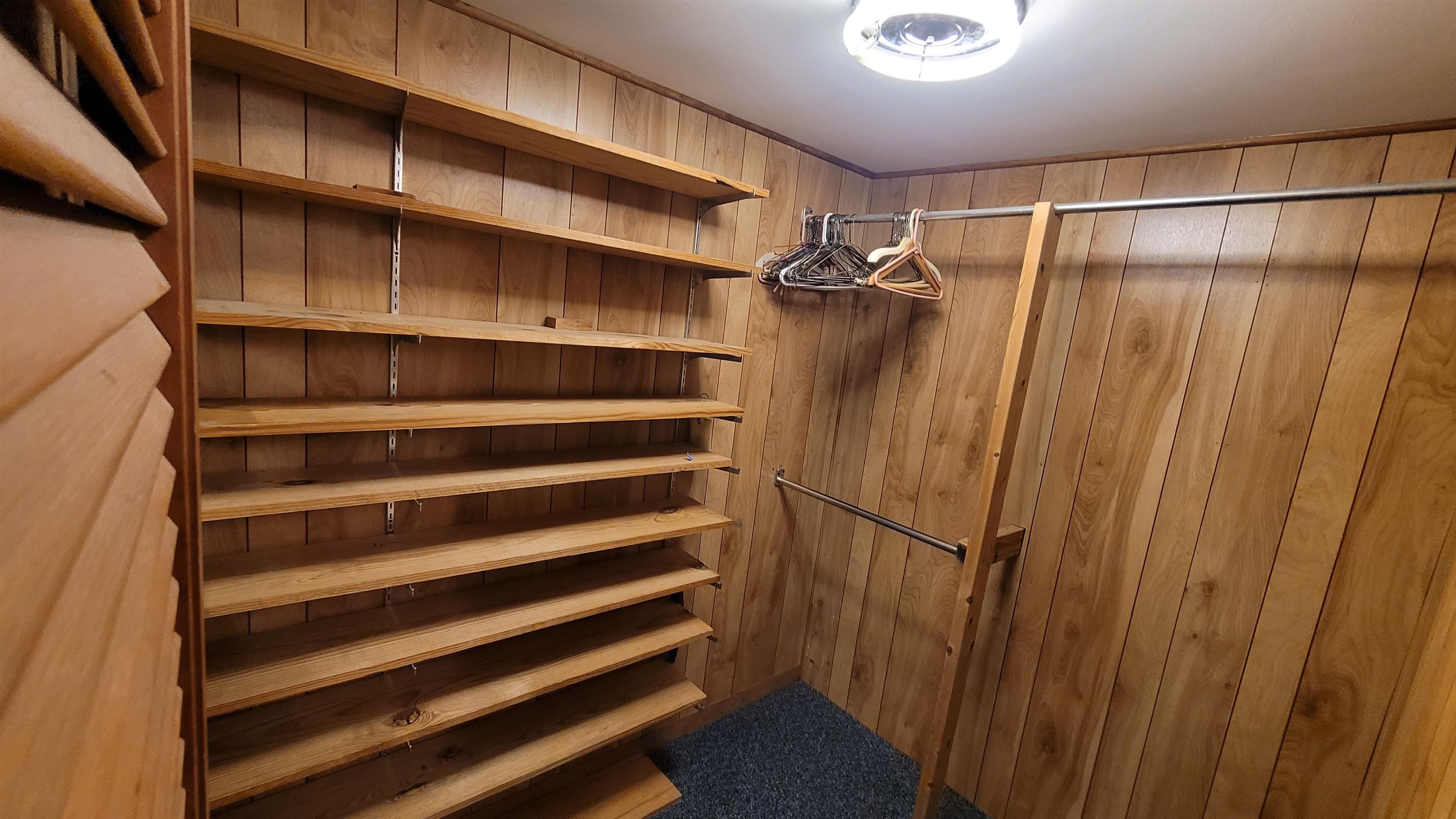 3745 Tchulahoma Road Memphis, TN 38118 - Photo 23 of 39 a view of walk in closet with empty racks