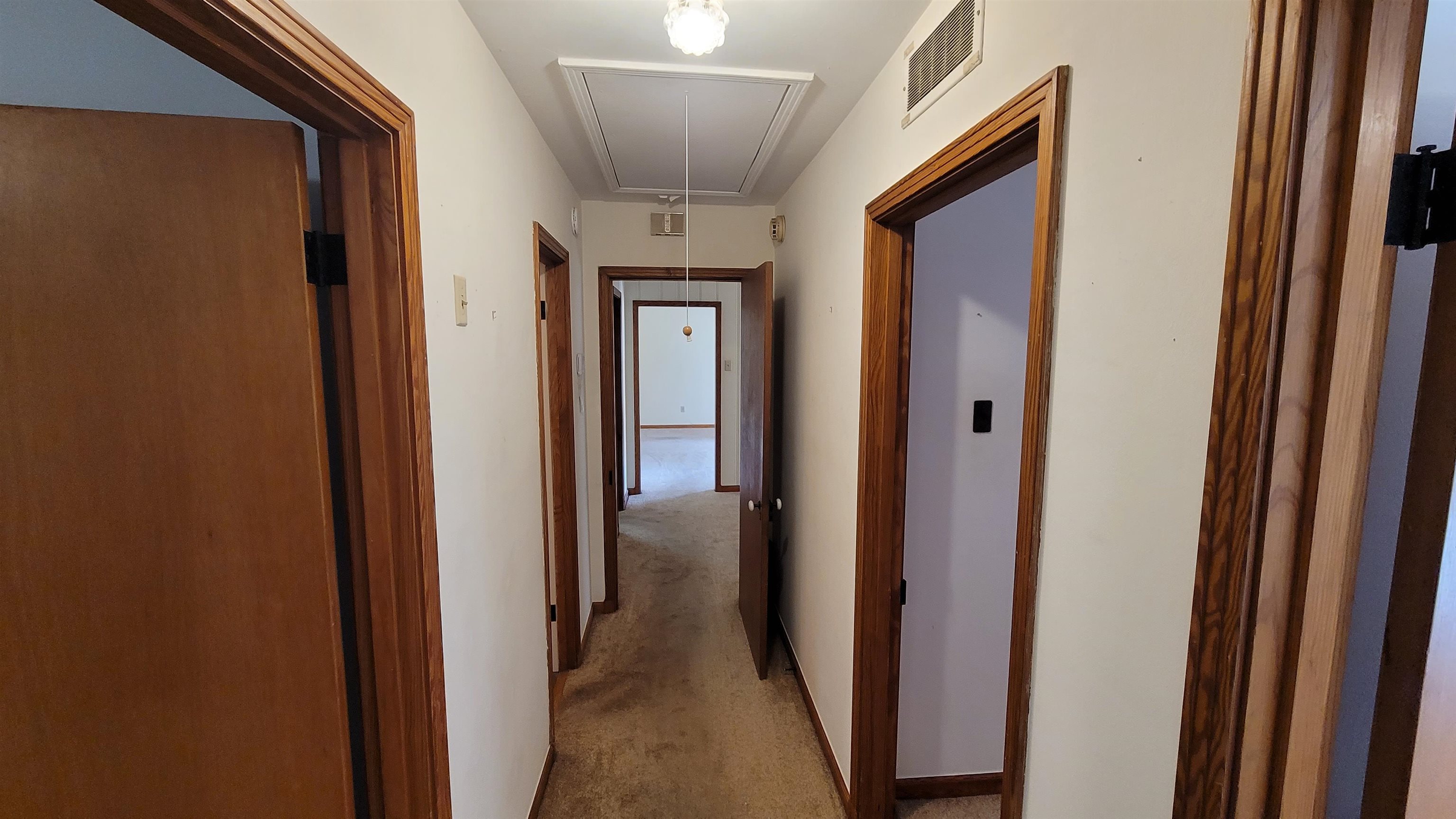 3745 Tchulahoma Road Memphis, TN 38118 - Photo 31 of 39 a view of a hallway with a wooden door