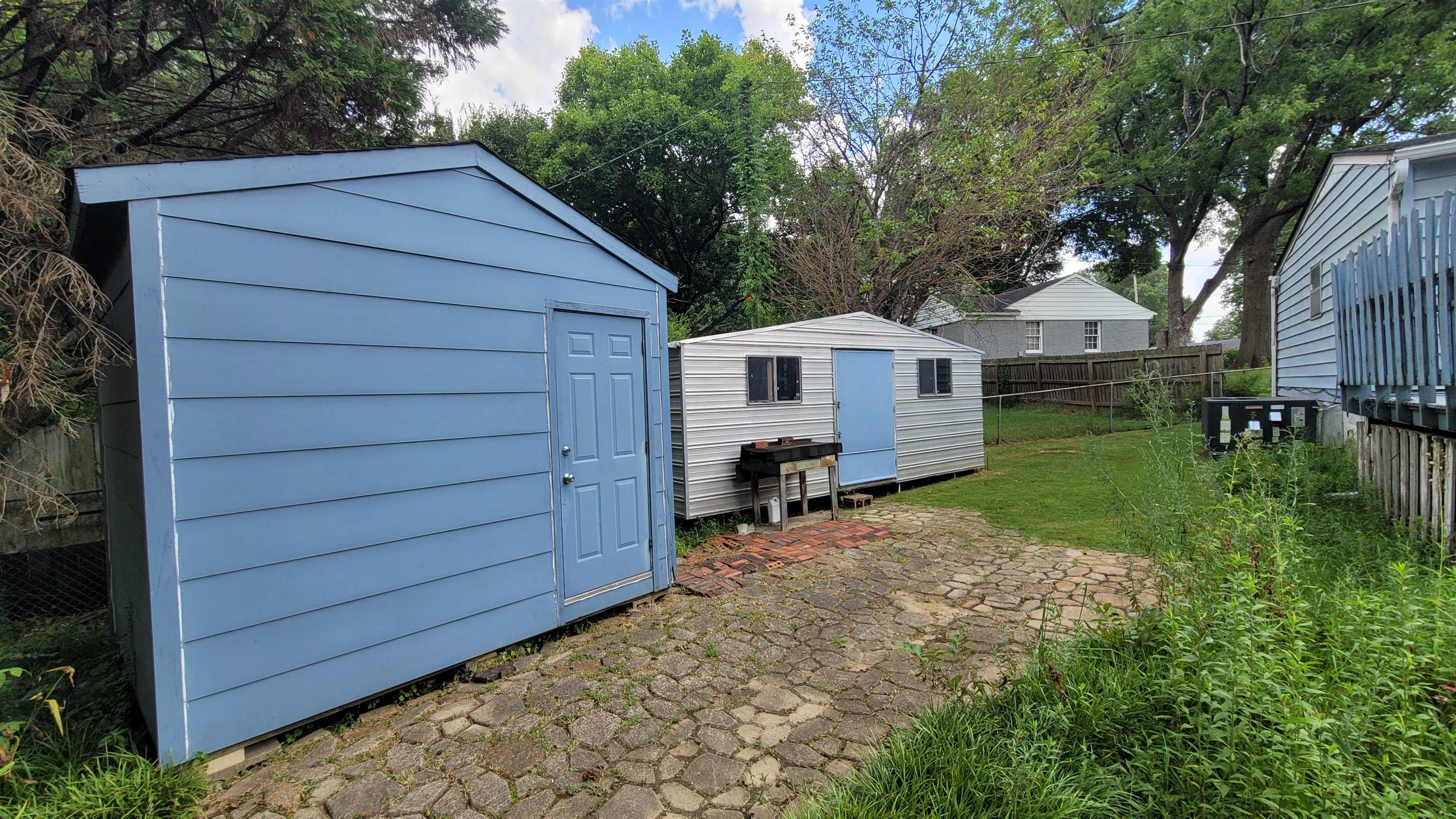 3745 Tchulahoma Road Memphis, TN 38118 - Photo 7 of 39 a view of a house with a yard
