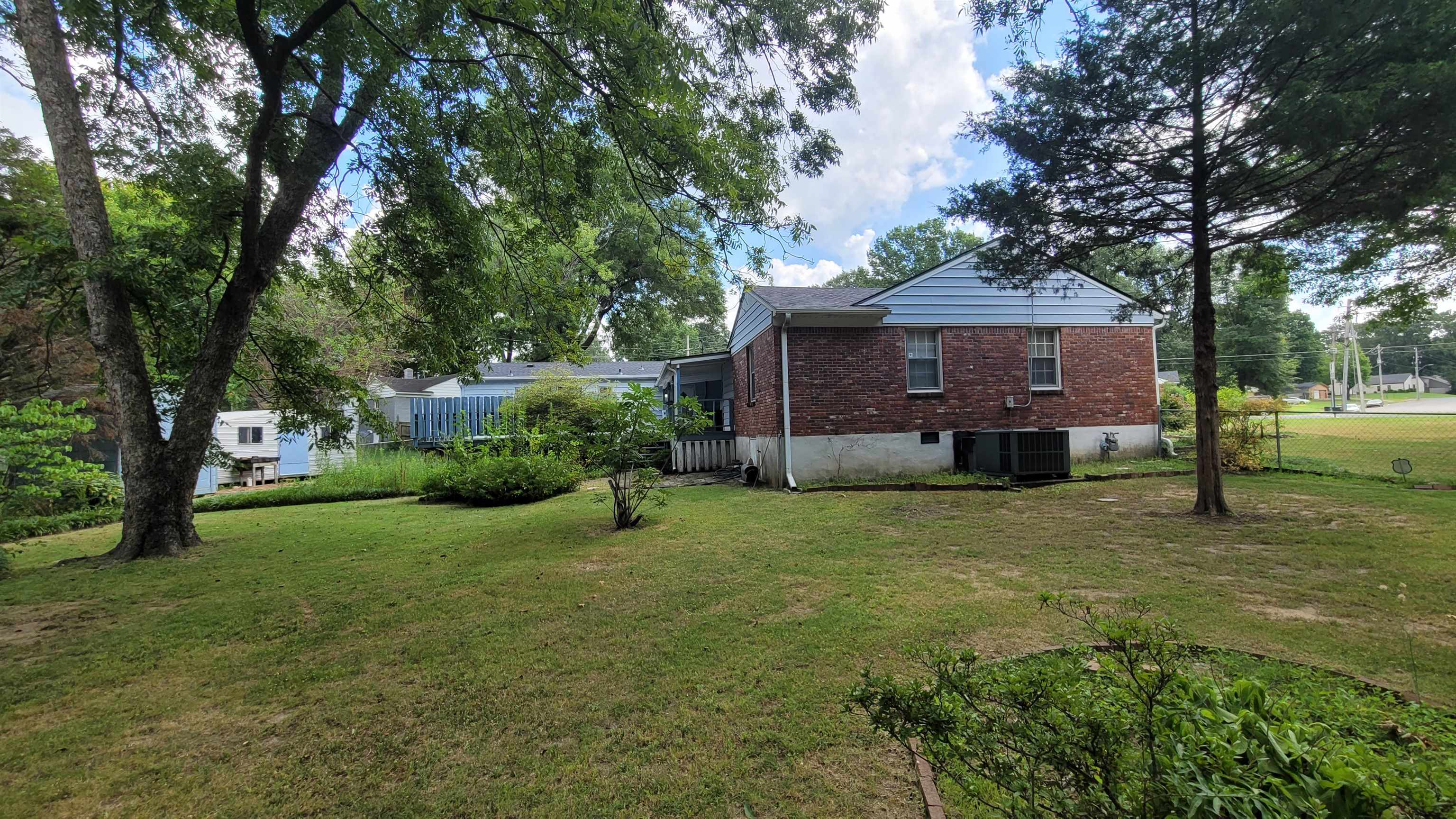 3745 Tchulahoma Road Memphis, TN 38118 - Photo 8 of 39 a view of a house with a backyard