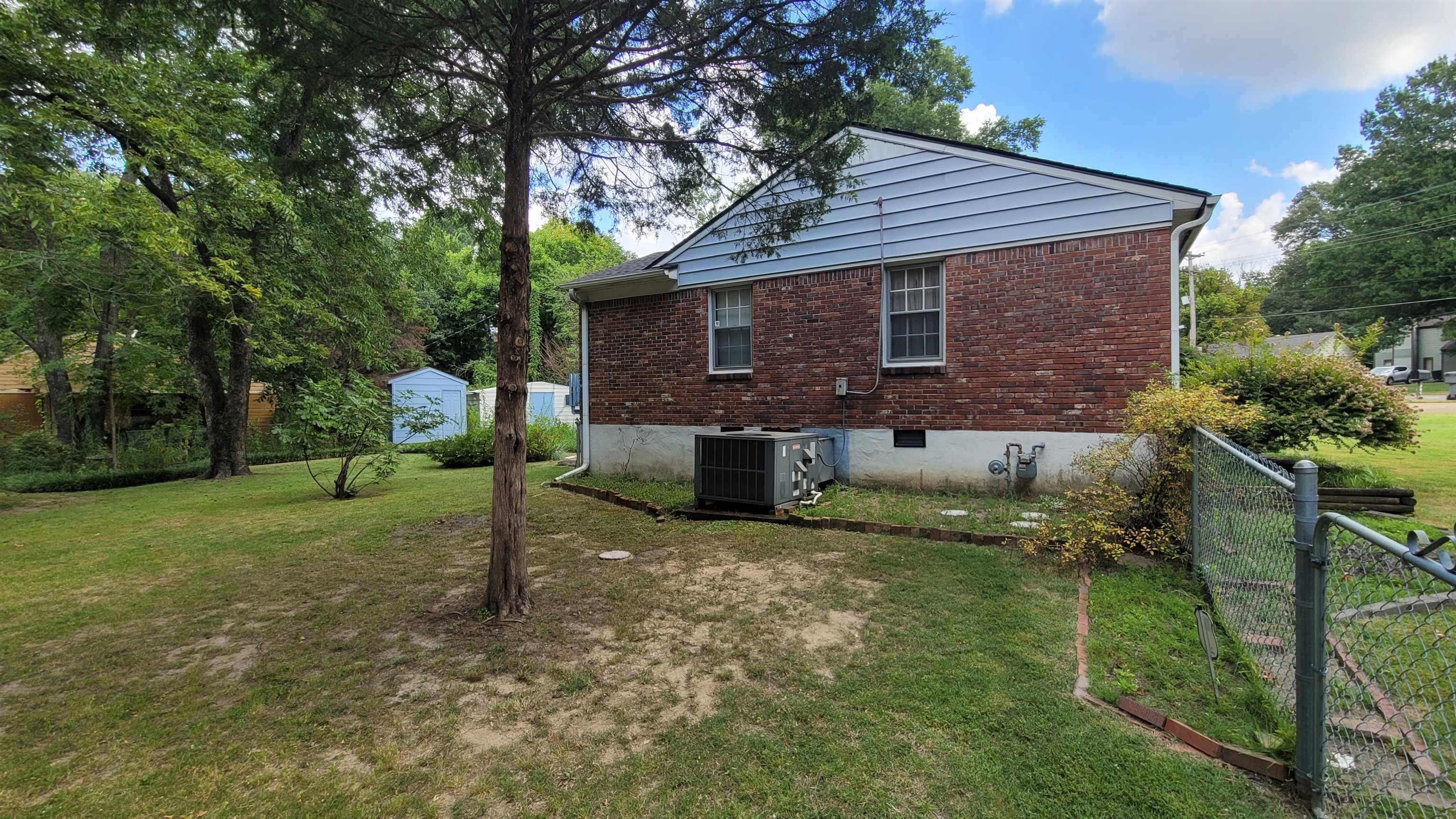 3745 Tchulahoma Road Memphis, TN 38118 - Photo 9 of 39 a view of a house with a yard